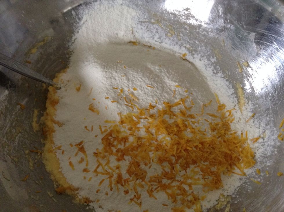 Grate in lemon zest
