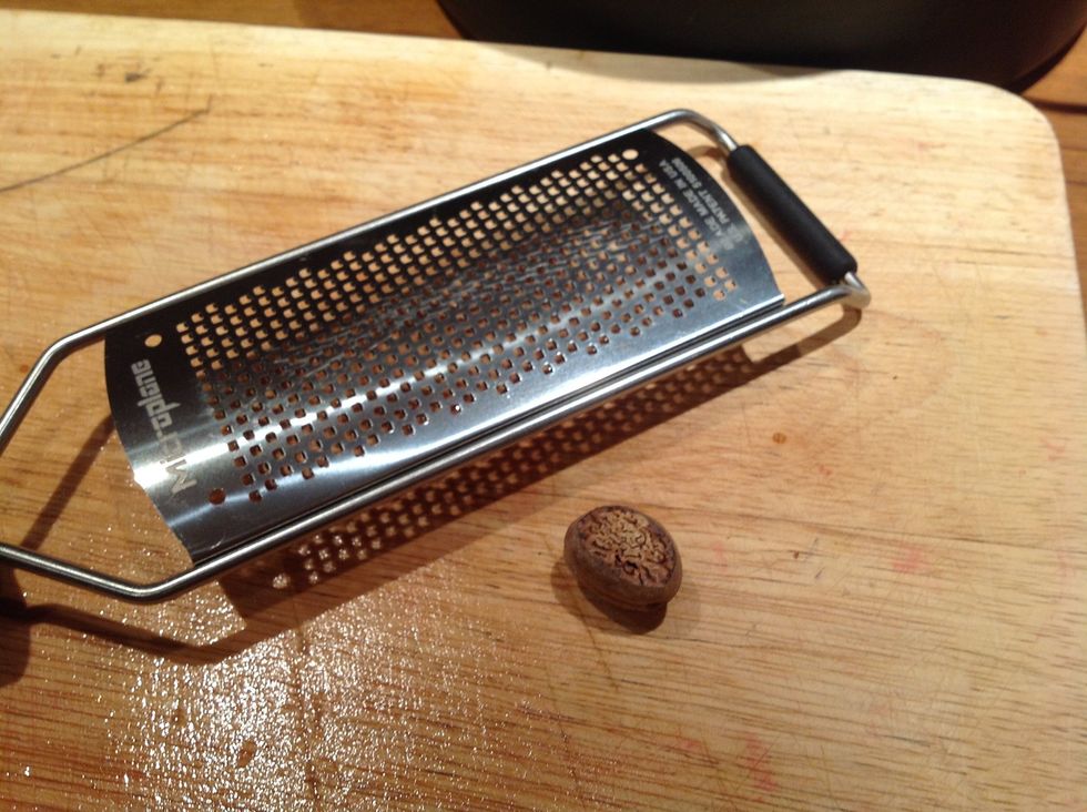 Grate in some nutmeg using a fine grater. One or two teaspoons worth.
