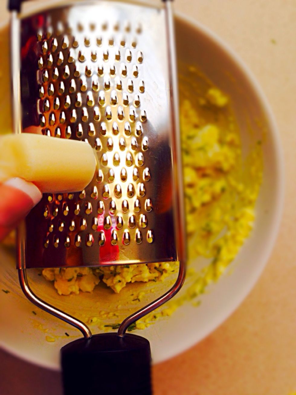 Grate leftover cheese into egg salad
