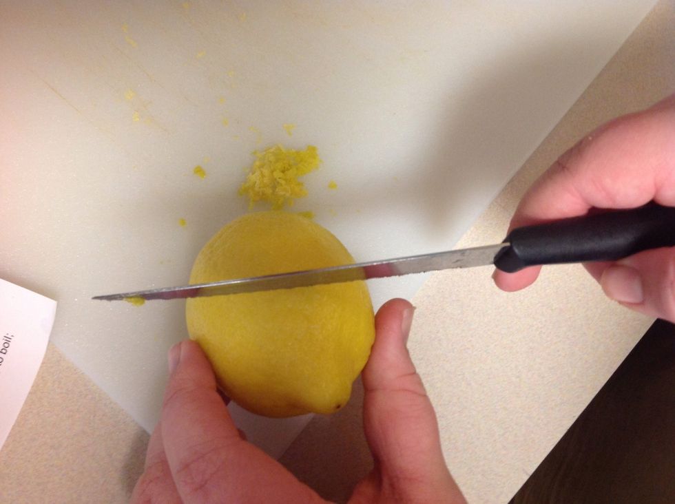 Grate lemon for lemon zest.