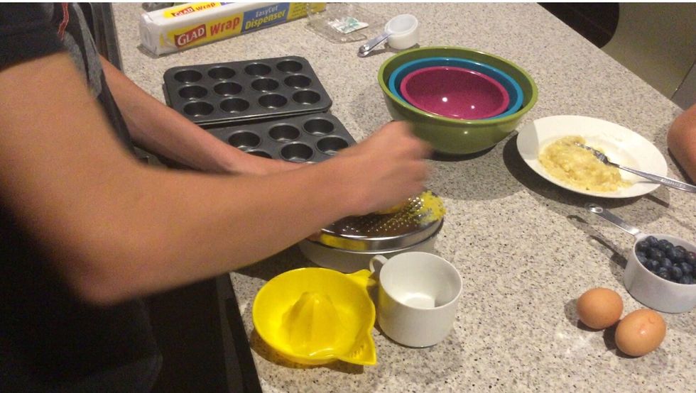Grate orange rind then juice the full orange