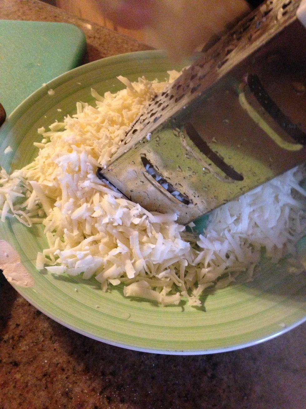 Grate some Monterey Jack cheese