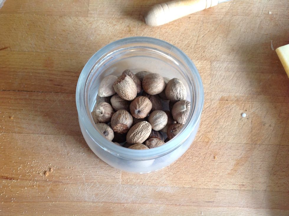 Grate some nutmeg into the white sauce