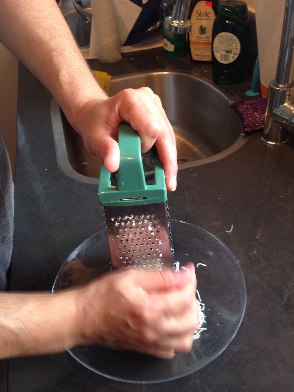 Grate some Parmesan cheese