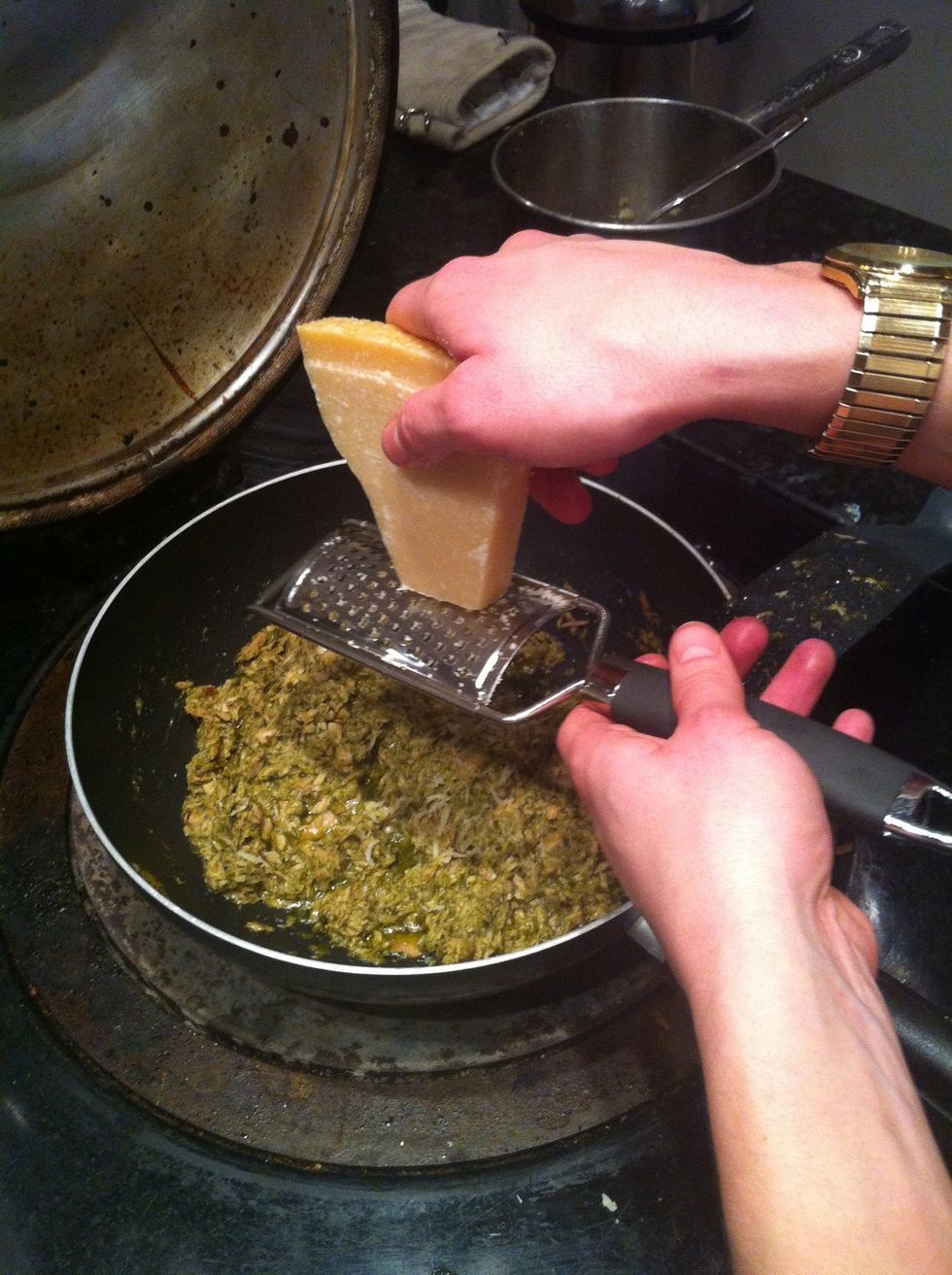 Grate some Parmesan into tuna pesto