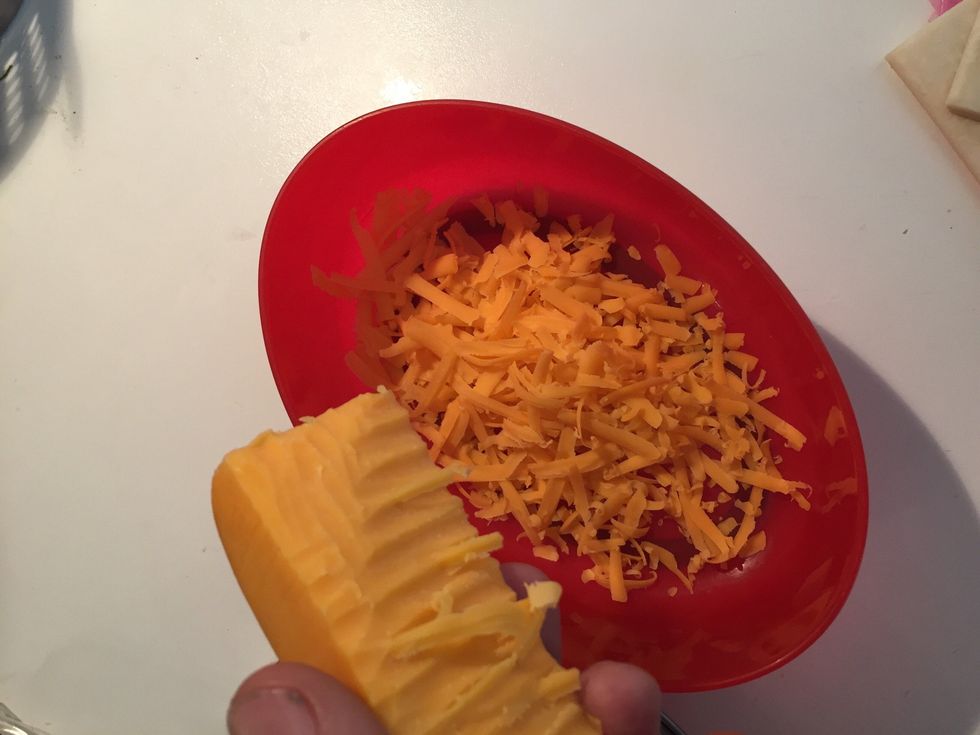 Grate some red cheddar cheeze \ud83d\ude0b