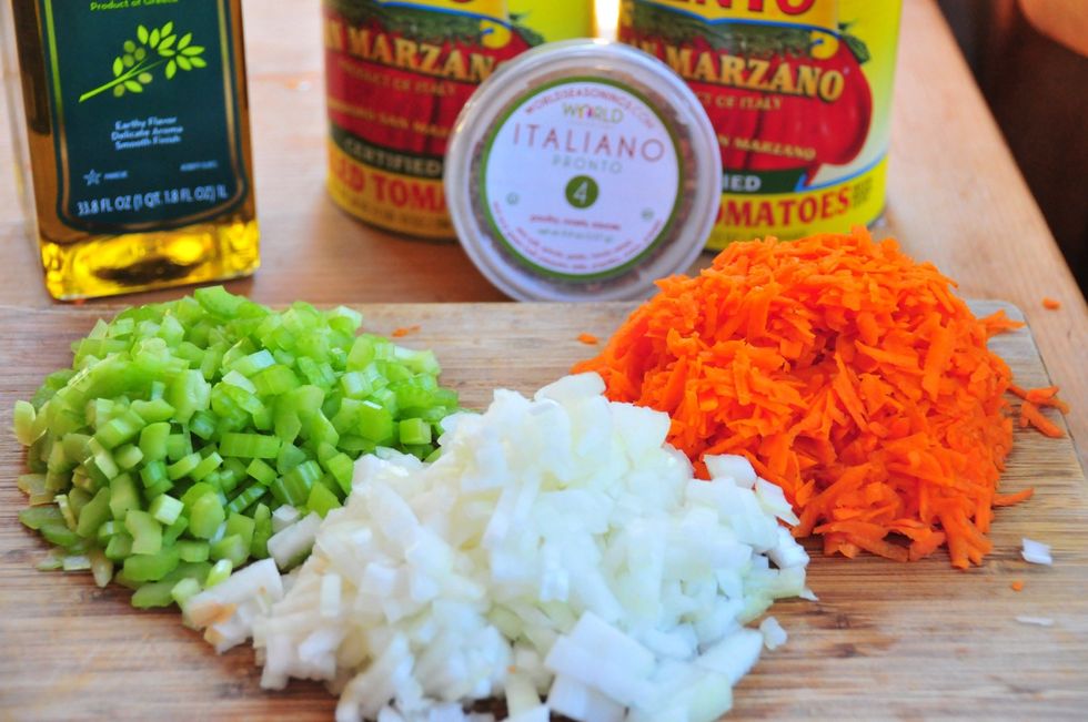 Grate the carrots with your cheese grater. Since I'm using a food mill later it wont matter.  Dice the celery and onion medium to small.  I think they cook better and release a deeper flavor.