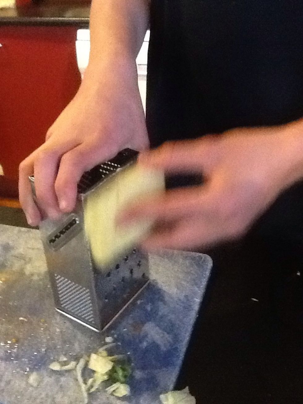 Grate the cheese.