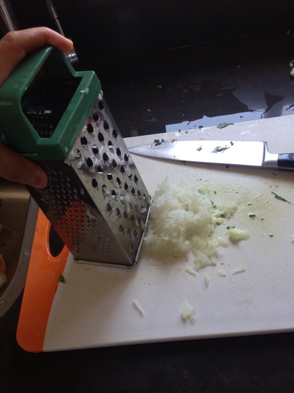 Grate the onion and add it in the mix