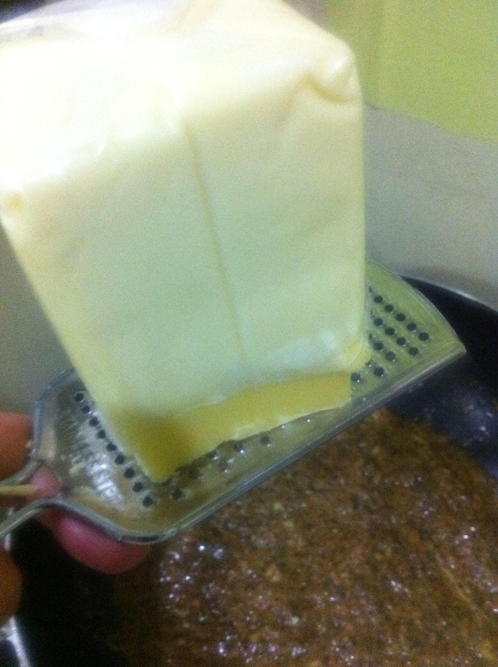 Grate the quick melt cheese over the top of the saute sauce, for about 1 cup and on the stove and cook for about 3 to 5 mins. Stir and quickly remove in the pan.:)