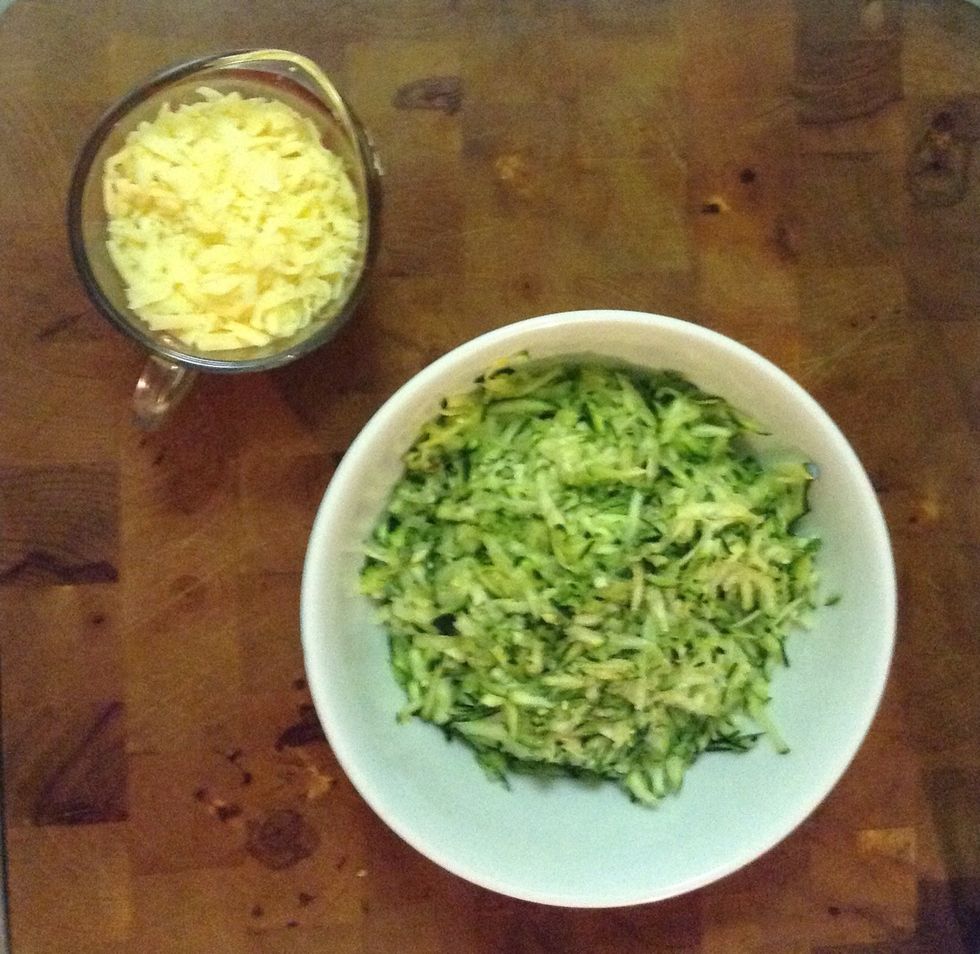 Grate the zucchini and cheese