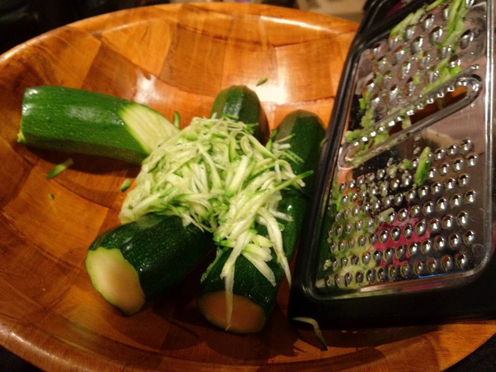 Grate them diagonally on the big holes grater to get long pieces