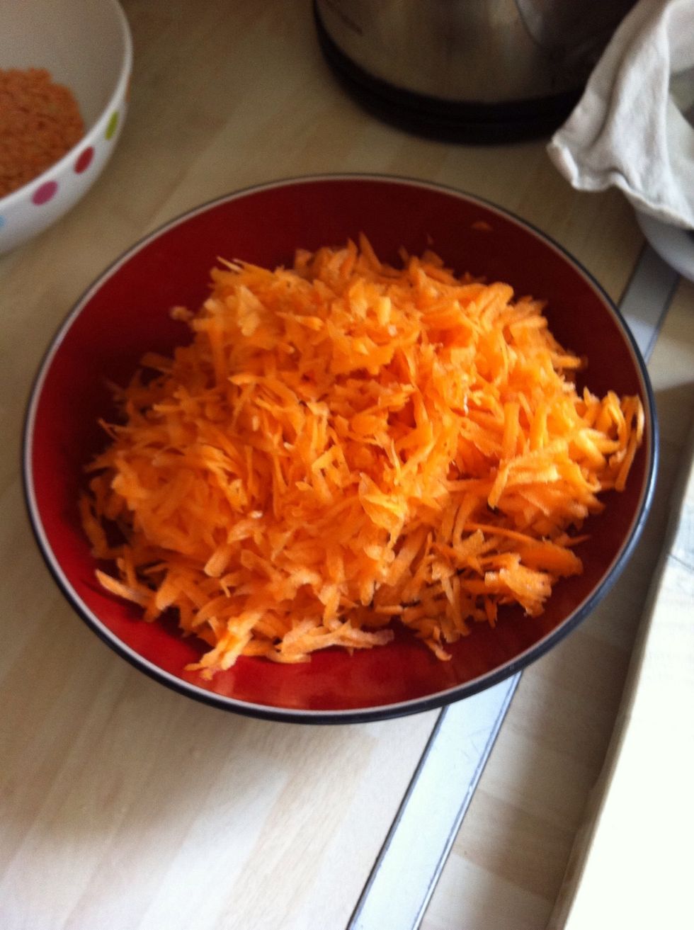 Grate your carrots ( no need to peel them just rinse and grate!) and weigh/ measure out other ingredients.