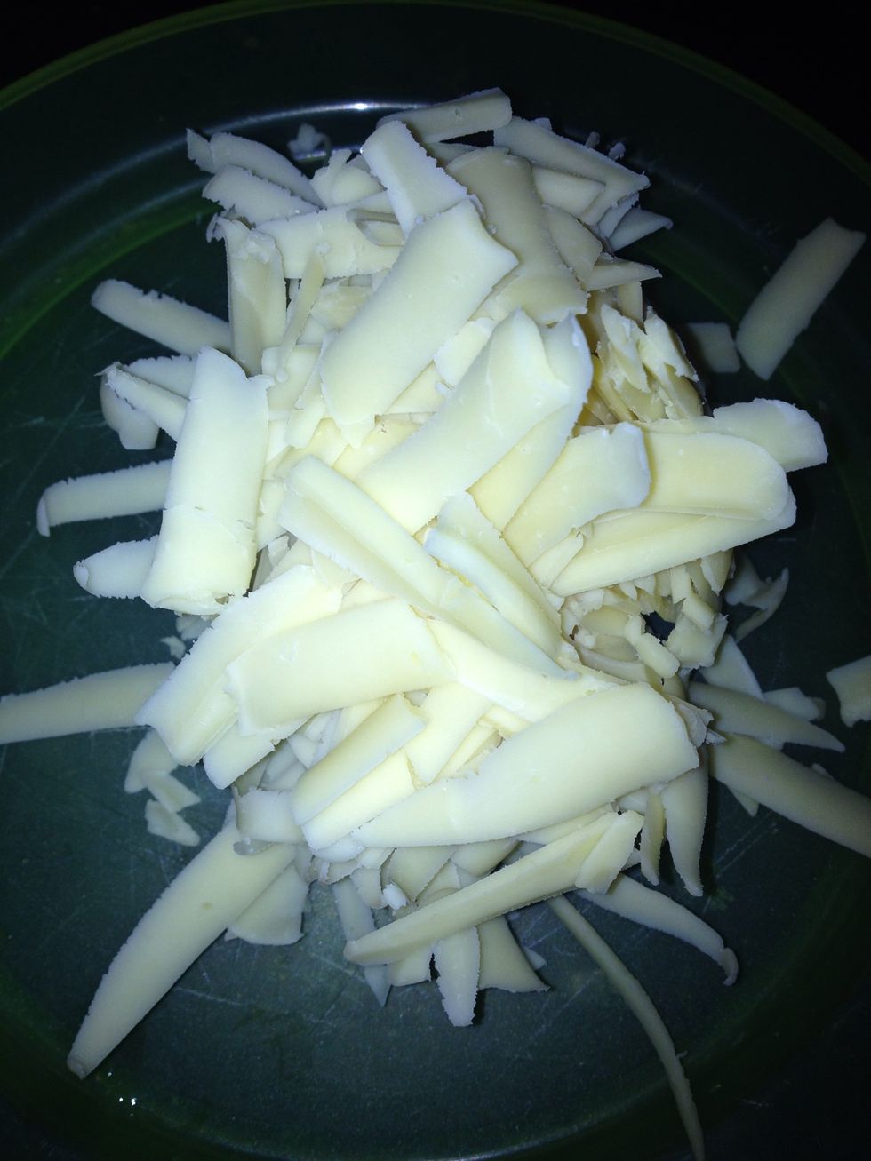 Grate Your cheese using the biggest grating side