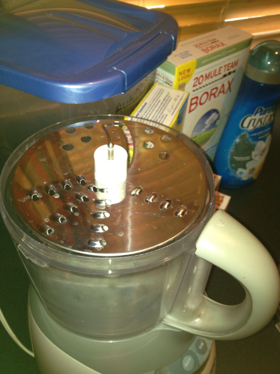 Grate your Fels Naptha soap bars. Use 2-4 bars. Last batch I used 4, here I used 2 because that's what I had on hand. If you don't have a food processor use a grater (watch your fingers).