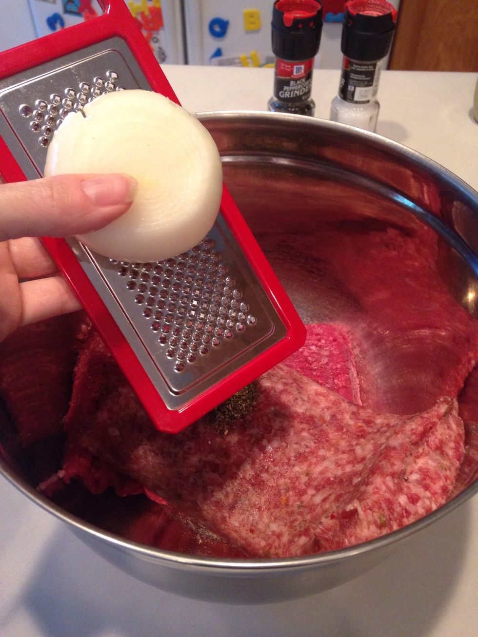 Grate your onion directly into the bowl. Be careful not to grate your finger when the onion gets small (lesson learned!)