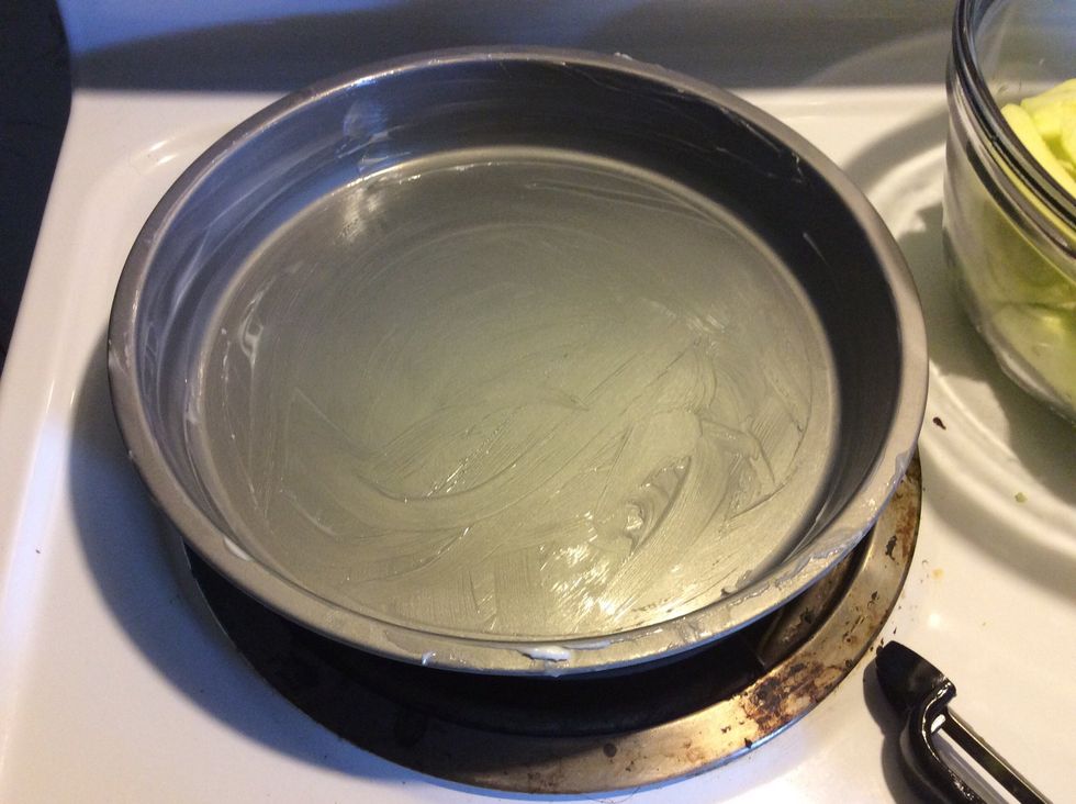 Grease a 9-inch round cake pan