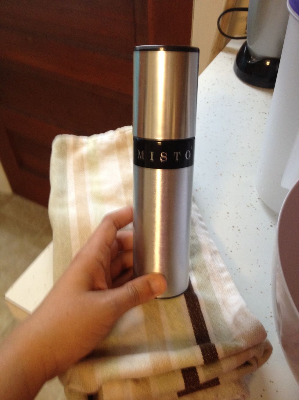 Grease a bowl with oil. I use my Misto with olive oil.