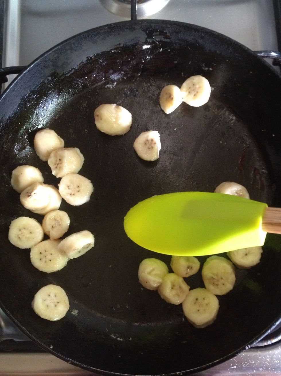 Grease a large pan with oil/butter and stir fry bananas for 2 minutes.