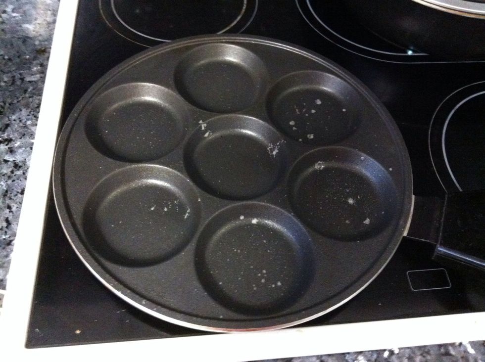 Grease a pan you can just use normal pan