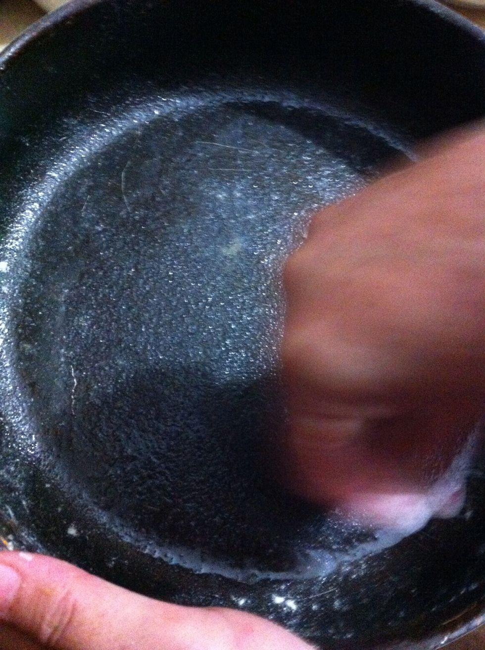 Grease and dust the pan