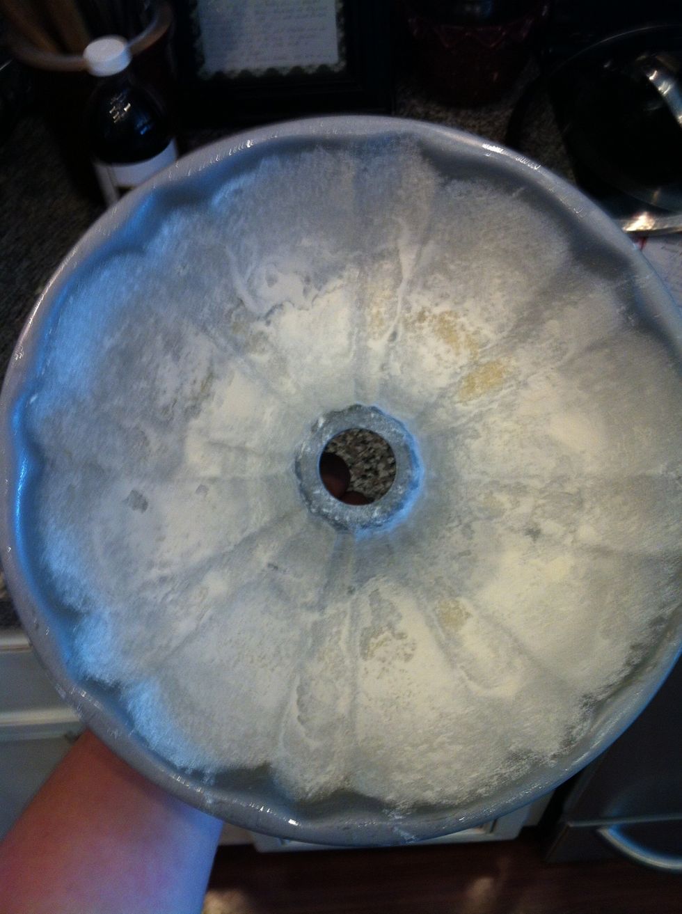 Grease and flour a bunt pan