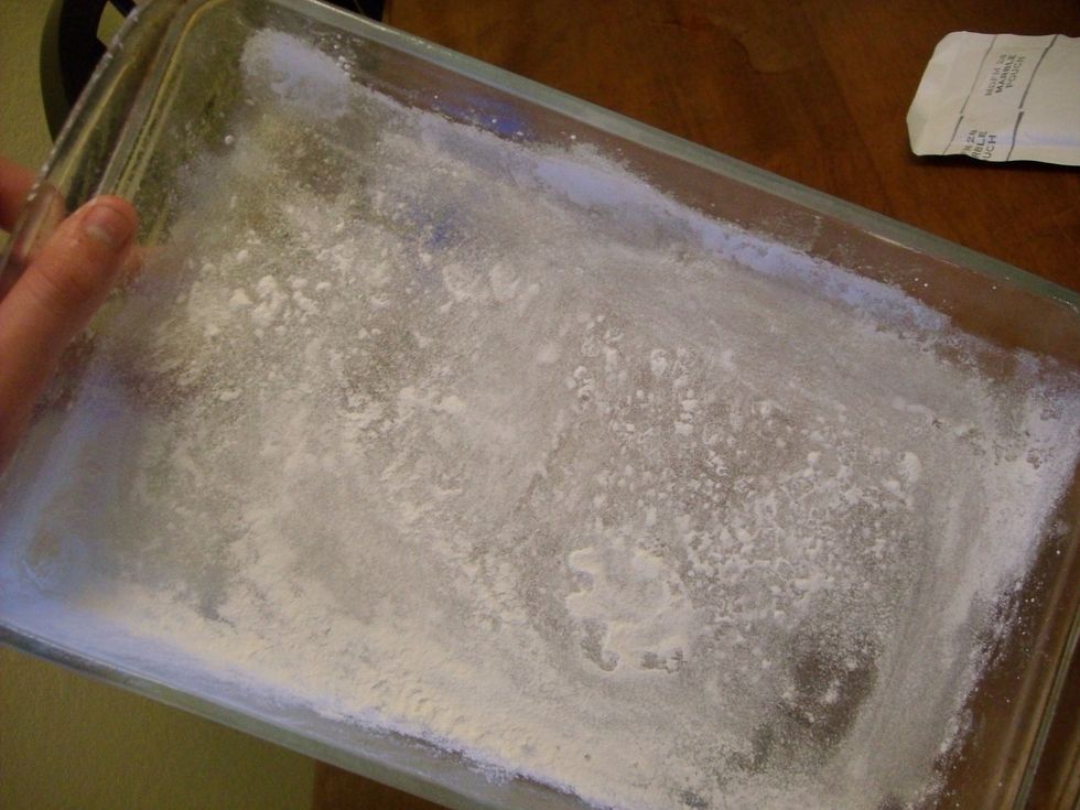 Grease and flour your cake pan.