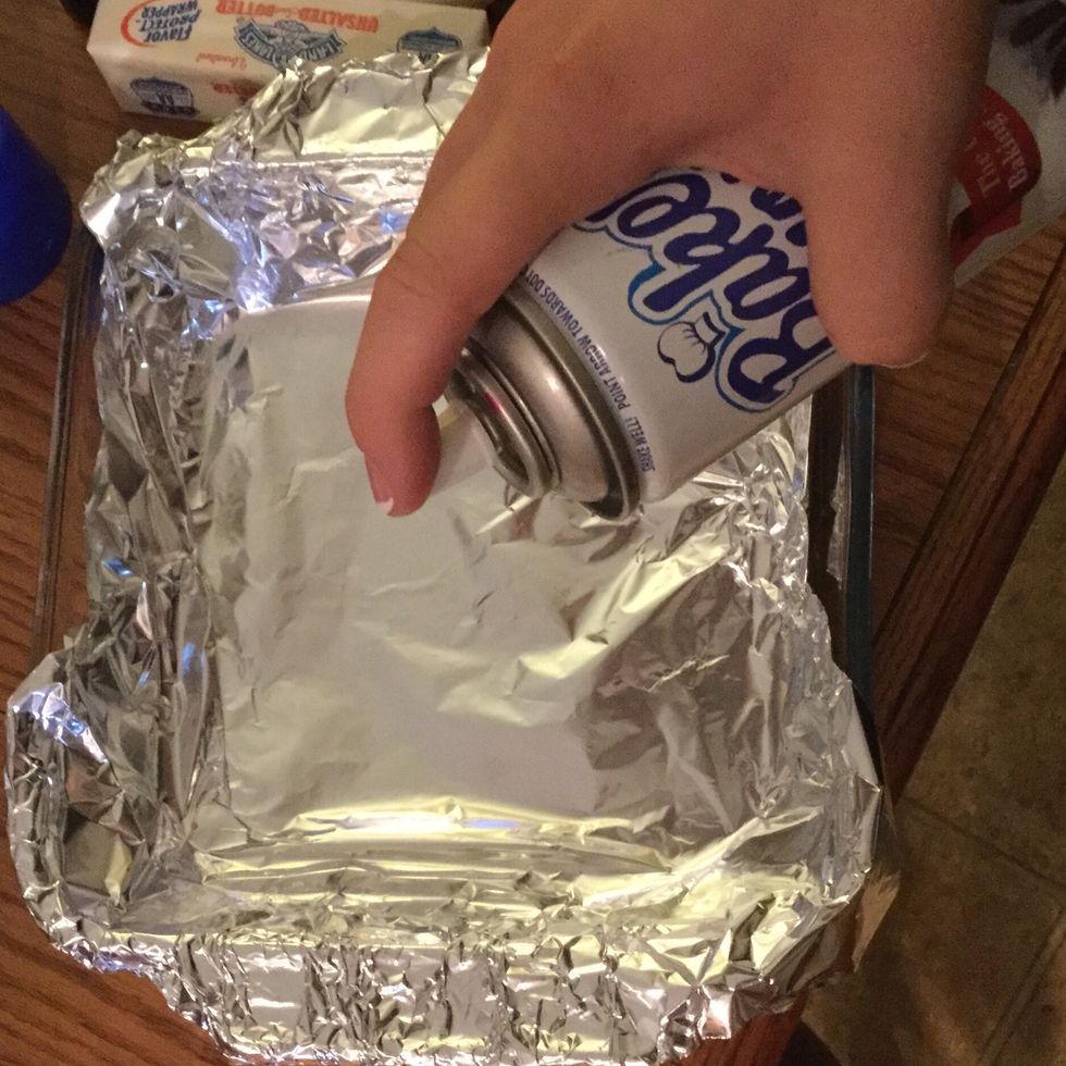 Grease bottom and sides of aluminum foil with cooking spray