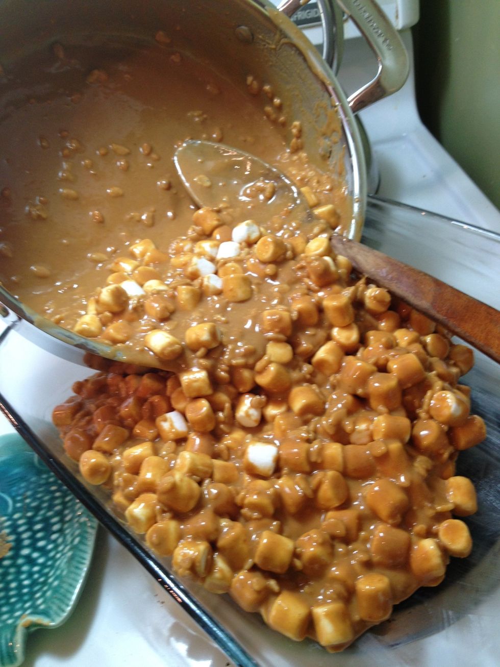 Grease glass pan with butter and then pour all of the mixture into the pan.