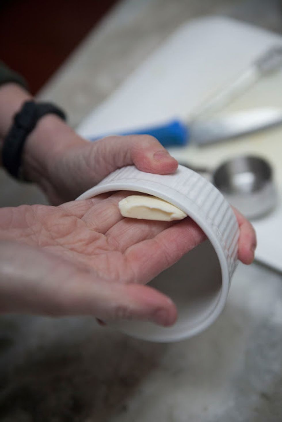 Grease individual ramekins or one 2 quart baking dish with butter.