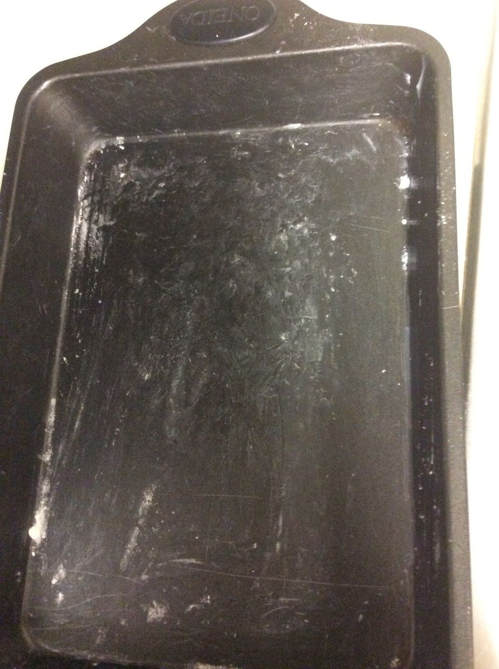 Grease pan with flour and shortening