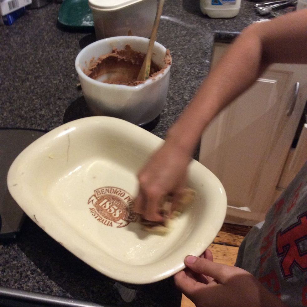 Grease the baking tray with butter
