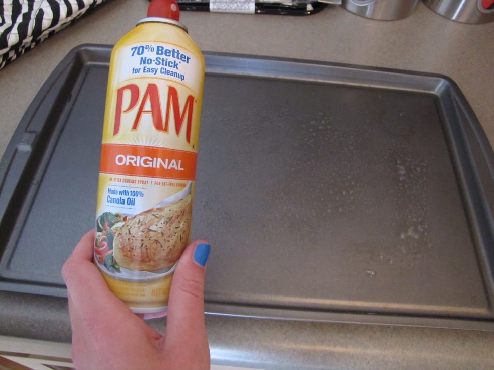 Grease the cookie sheet(s) with cooking spray. Lightly spray the entirety of the pan (so the baked cookies won't stick to it).
