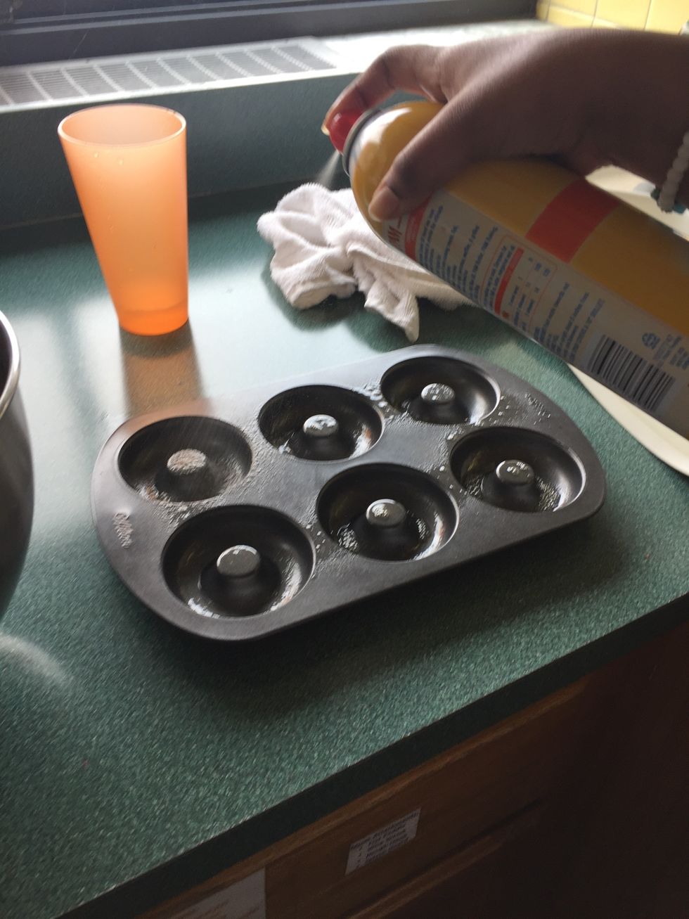 Grease the donut pan