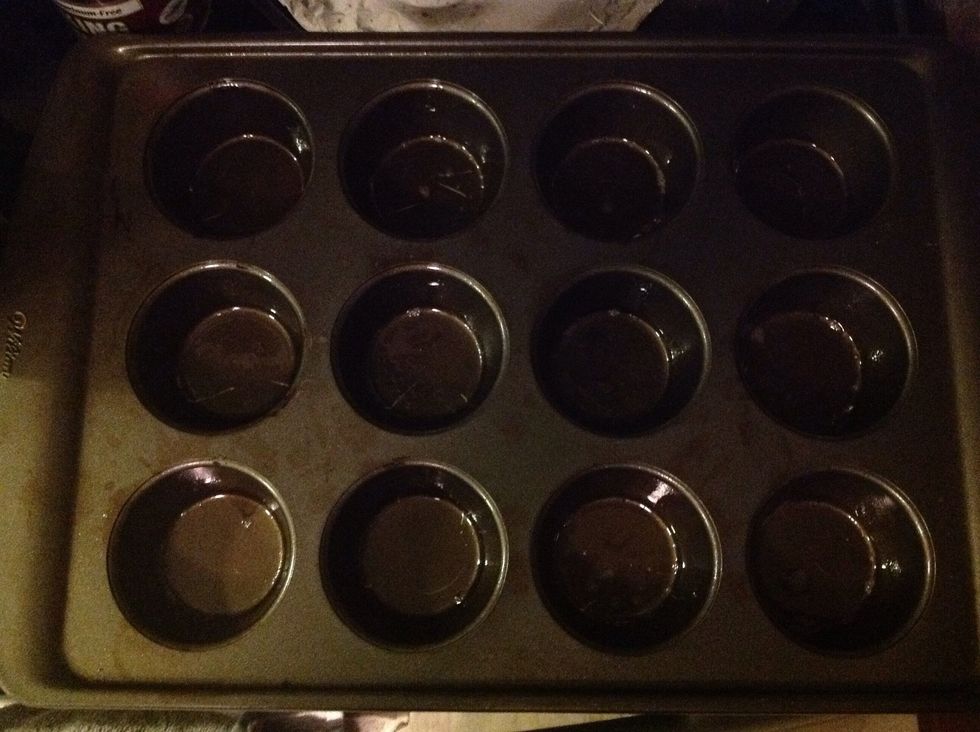 Grease the muffin pans. You can also use cupcake liners if you like.