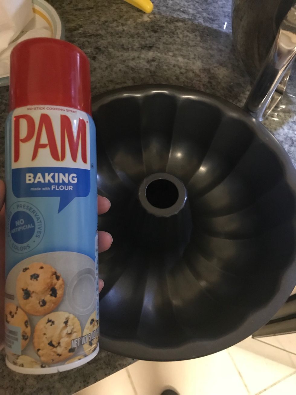Grease the pan, I\u2019m using this pam spray that has flour in it, but if you don\u2019t have it just grease and flour the pan.