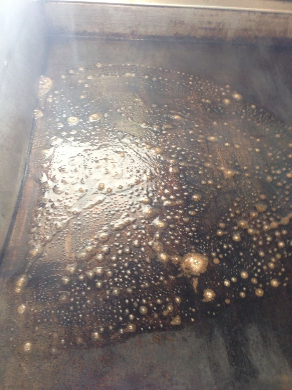 Grease the pan with the butter