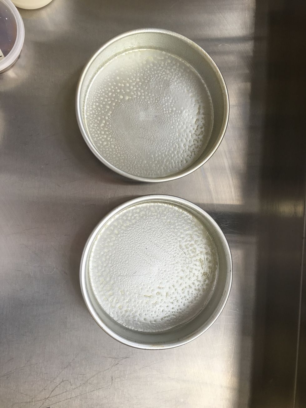 Grease two 8-inch cake pans with cooking spray or softened butter.