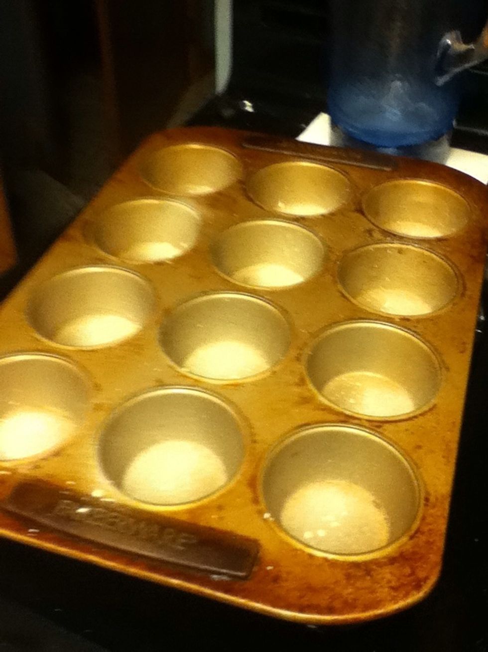 Grease up a muffin tin.
