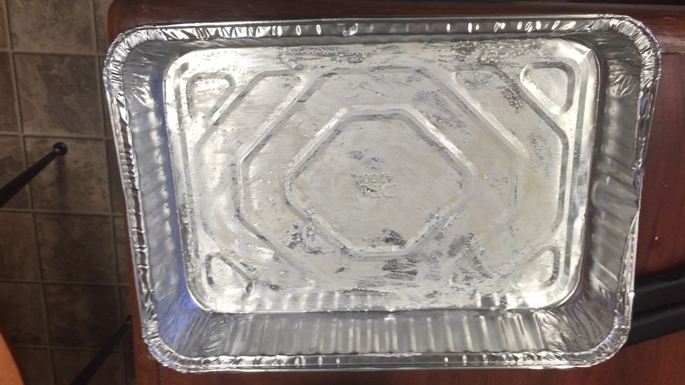 Grease your 13 by 9 in pan with butter.