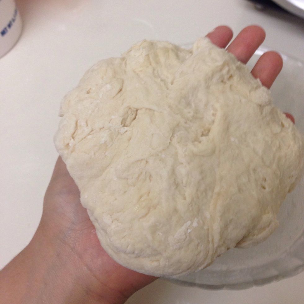 Grease your hand with  oil and knead until  the dough is soft