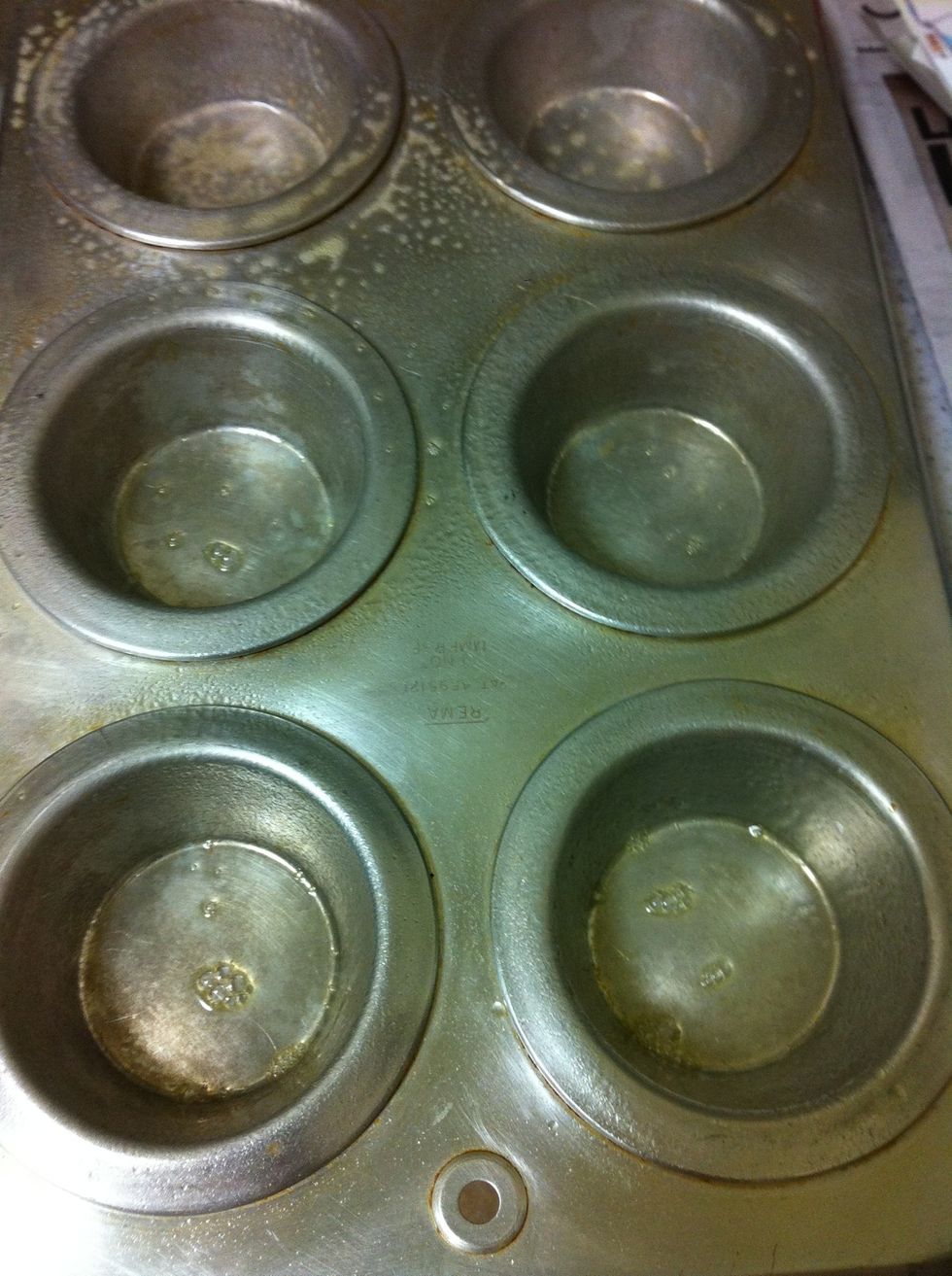 Grease your muffin tin