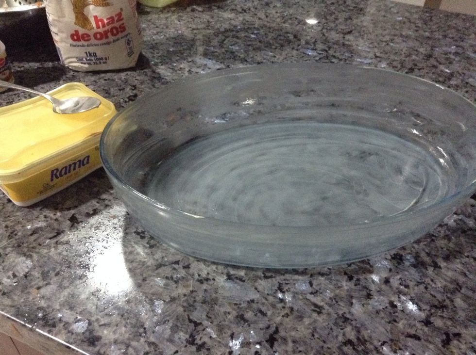 Greasy a container with butter.