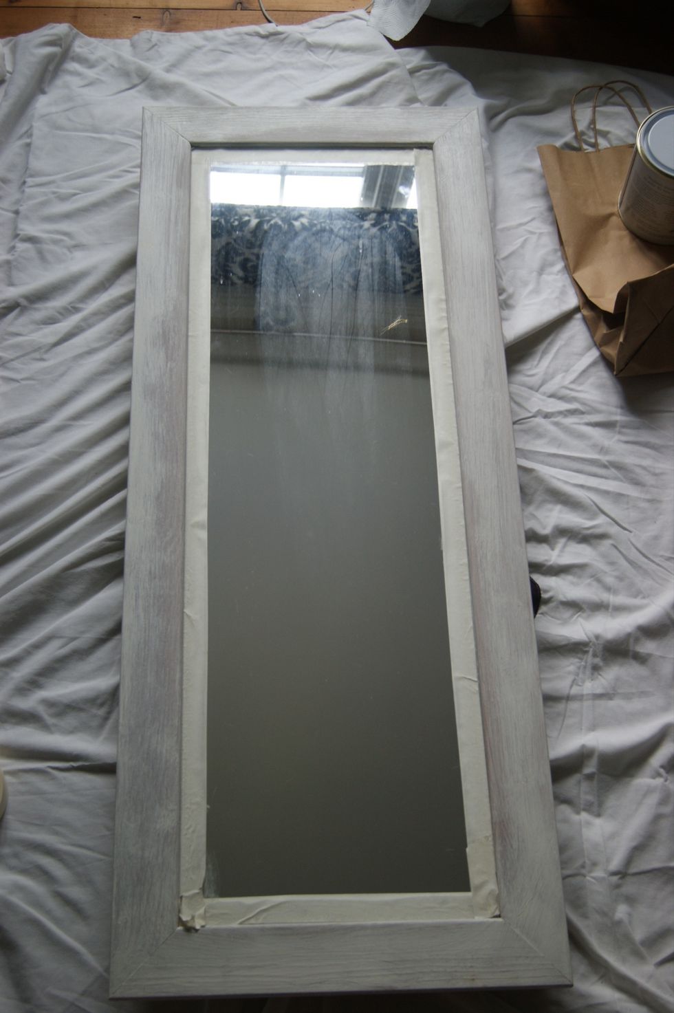 Great thing about chalk paint .... No prep! I masked the mirror and did a thin coat of old white. I wanted to achieve shabby chic, hence using two colours.