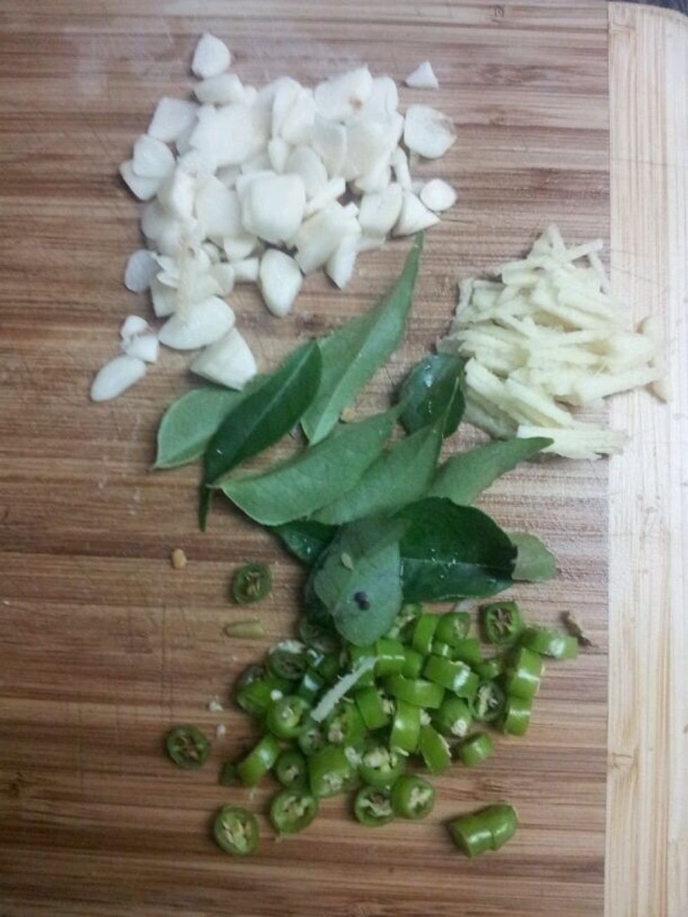 green chilies, chopped ginger, garlic and curry leaves