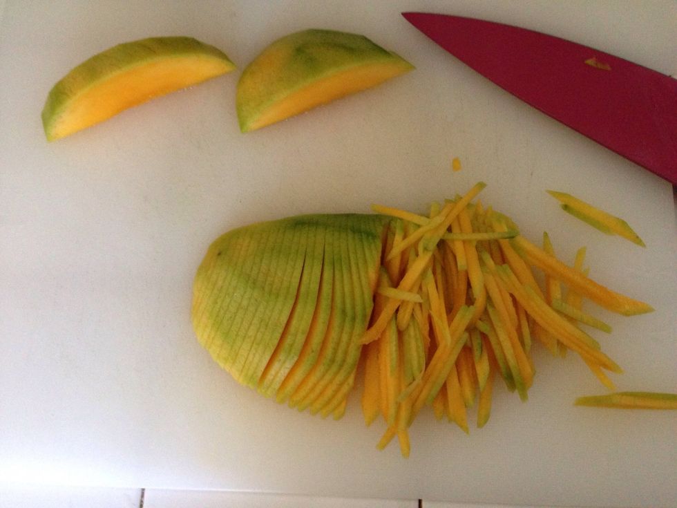 Green mango peeled, then Julienne Cut.
