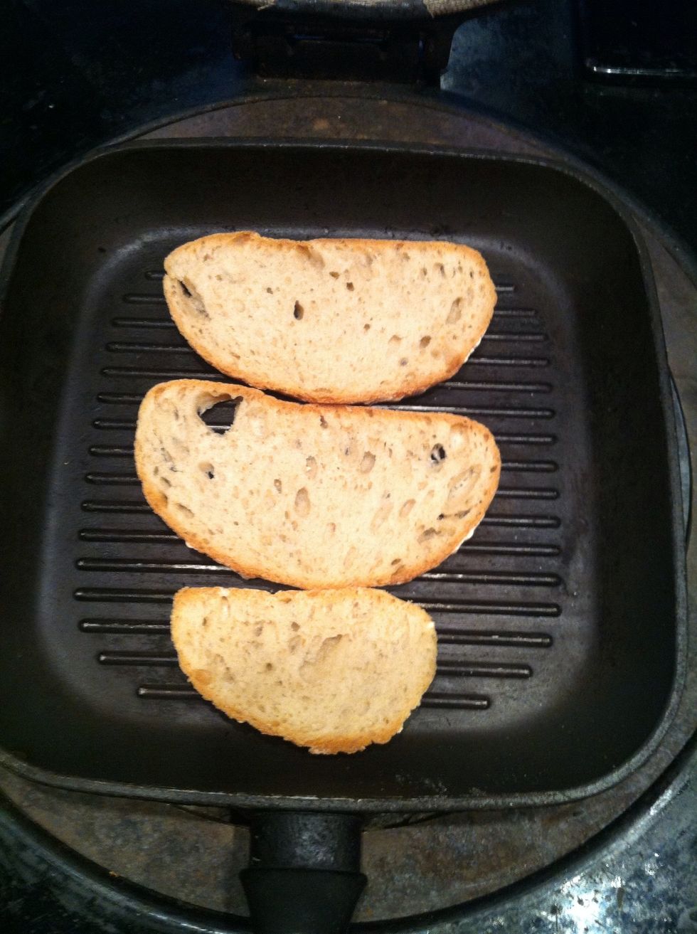 Grill some bread ( I'm using sour dough bread and German whole grain bread) use any kind u love :) don't add any oil