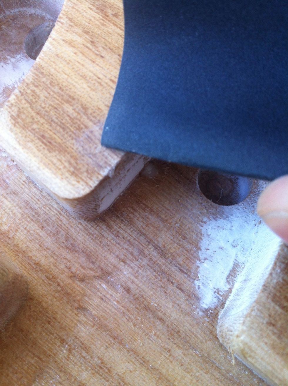 grind down the high spots with a fine sandpaper if needed.