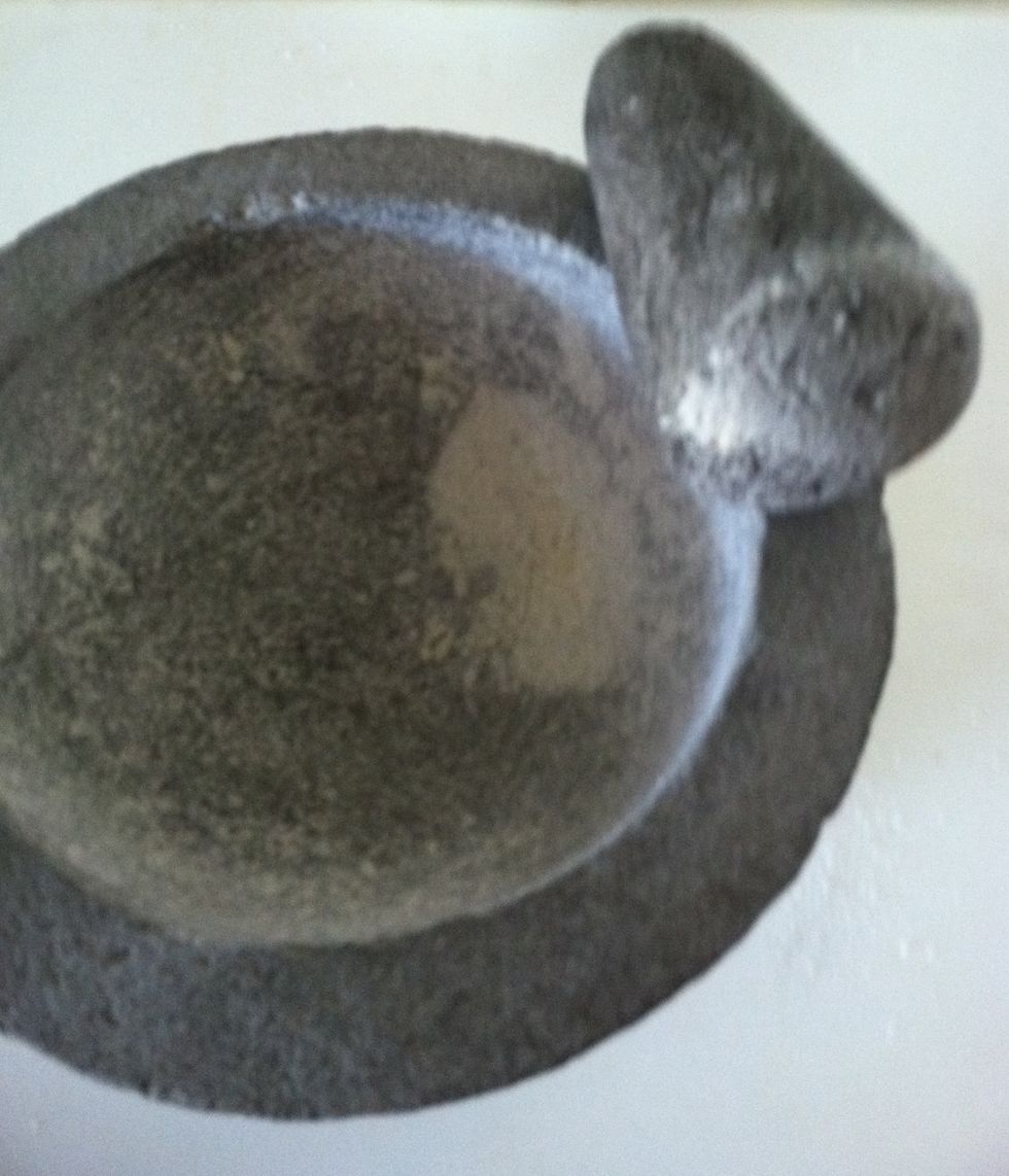 Grind rice grains against the entire inside surface of bowl