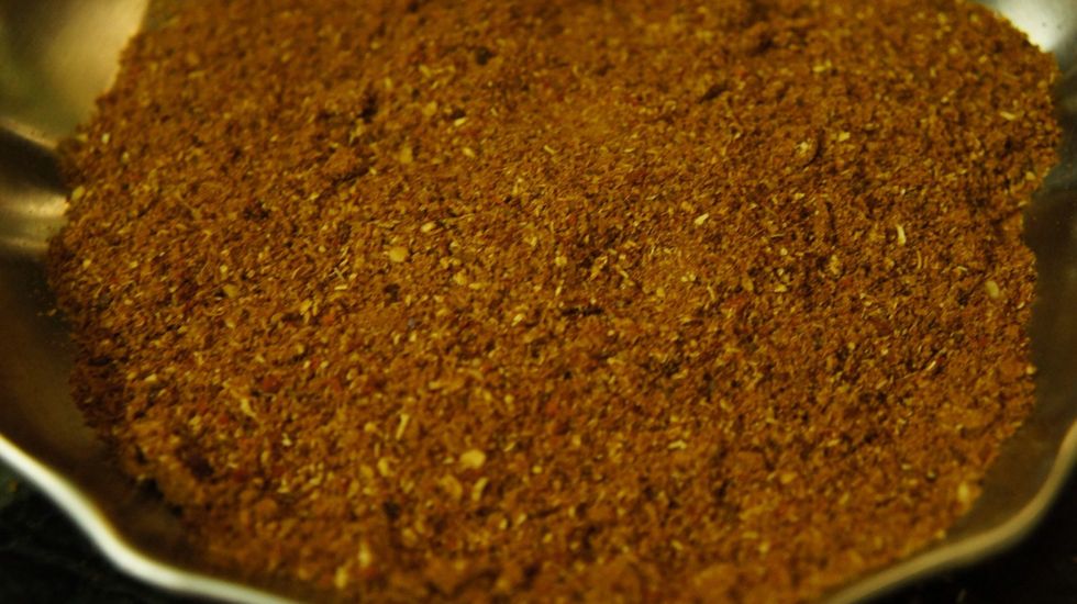 Grind the mixture of red chillis, coriander, cumins and garam masala to a fine powder...